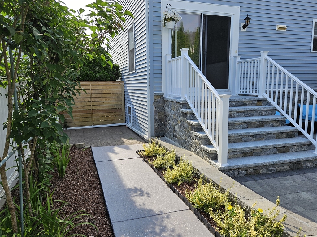 33 Barclay Street Fall River, MA 02724 - Photo 12 of 37 a view of stairs and flowers