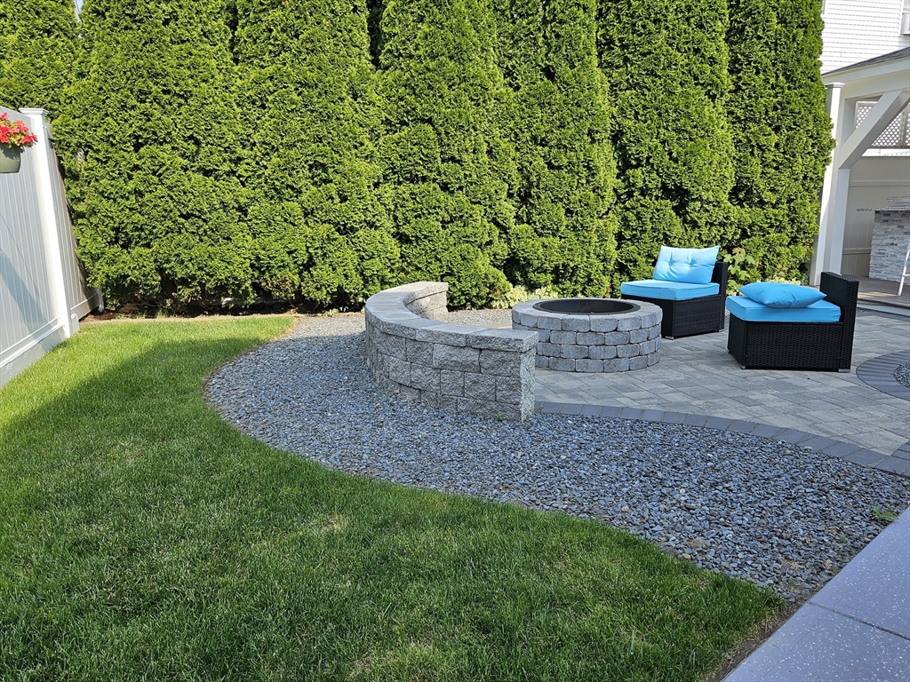 33 Barclay Street Fall River, MA 02724 - Photo 16 of 37 a view of a garden with potted plants