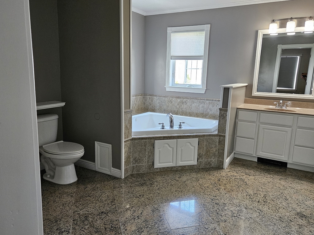 33 Barclay Street Fall River, MA 02724 - Photo 26 of 37 a spacious bathroom with a sink a toilet and a bathtub