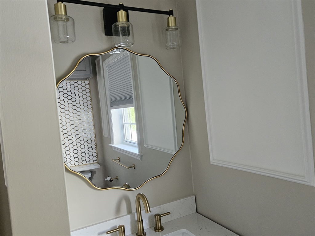 33 Barclay Street Fall River, MA 02724 - Photo 29 of 37 a view of entryway with wooden floor