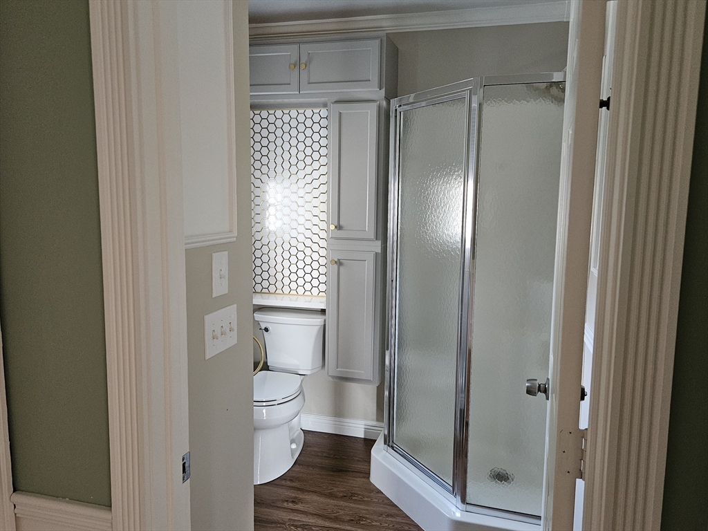 33 Barclay Street Fall River, MA 02724 - Photo 31 of 37 a bathroom with a shower and a toilet