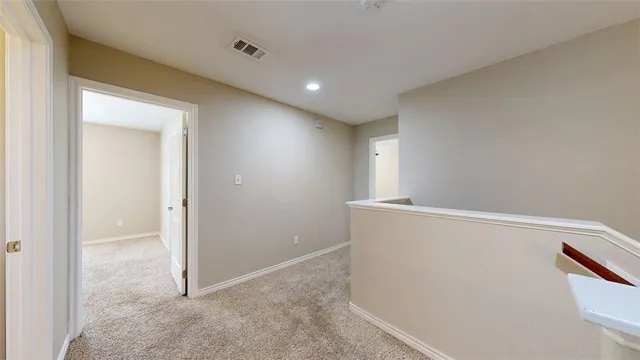 a bathroom with a granite countertop sink toilet and mirror