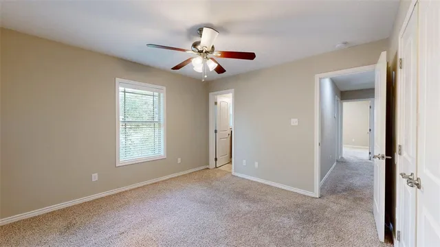 a bathroom with a toilet a sink and bathtub