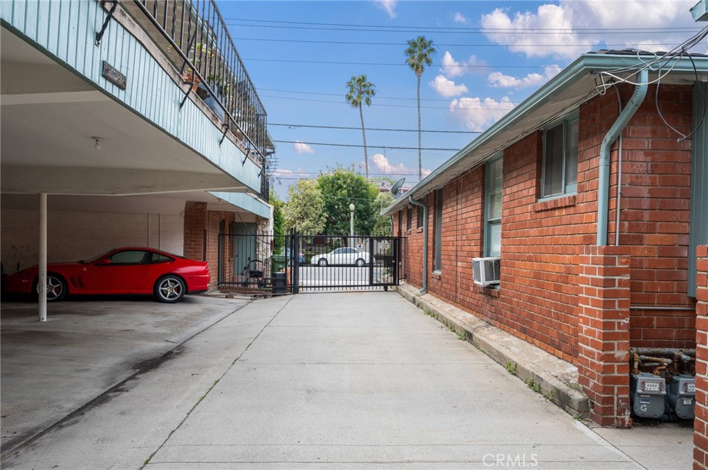 2025 Cloverfield Boulevard, Unit C Santa Monica, CA 90404 - Photo 31 of 36 a view of a car park in front of house