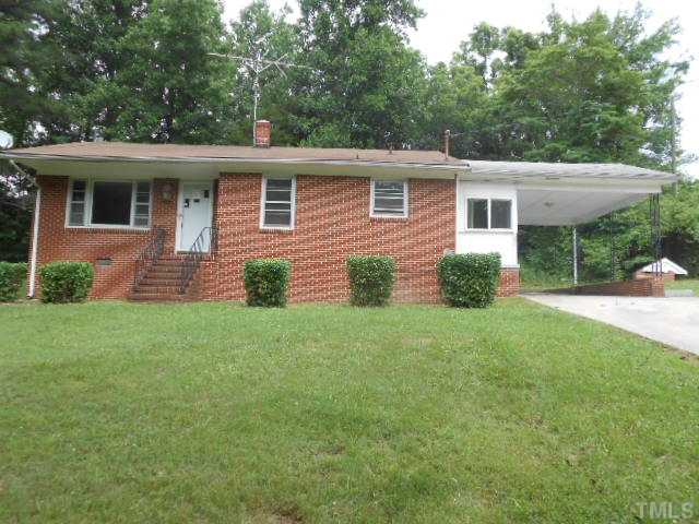321 Gravitte Road Roxboro, NC 27573 - Photo 1 of 9 a view of a house with a yard