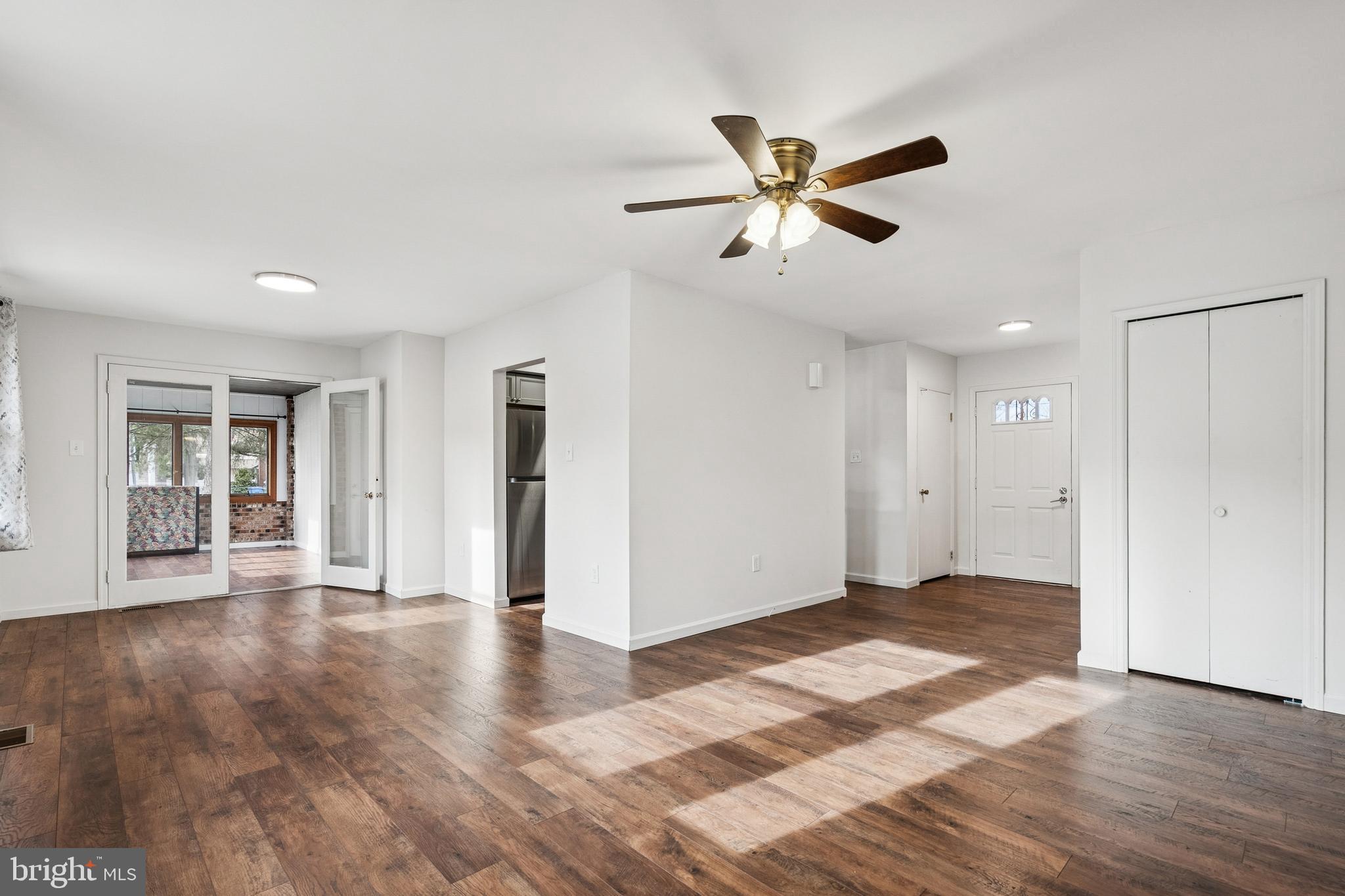 715 Cooper Landing Road Cherry Hill, NJ 08002 - Photo 14 of 23 a view of an empty room with window and wooden floor