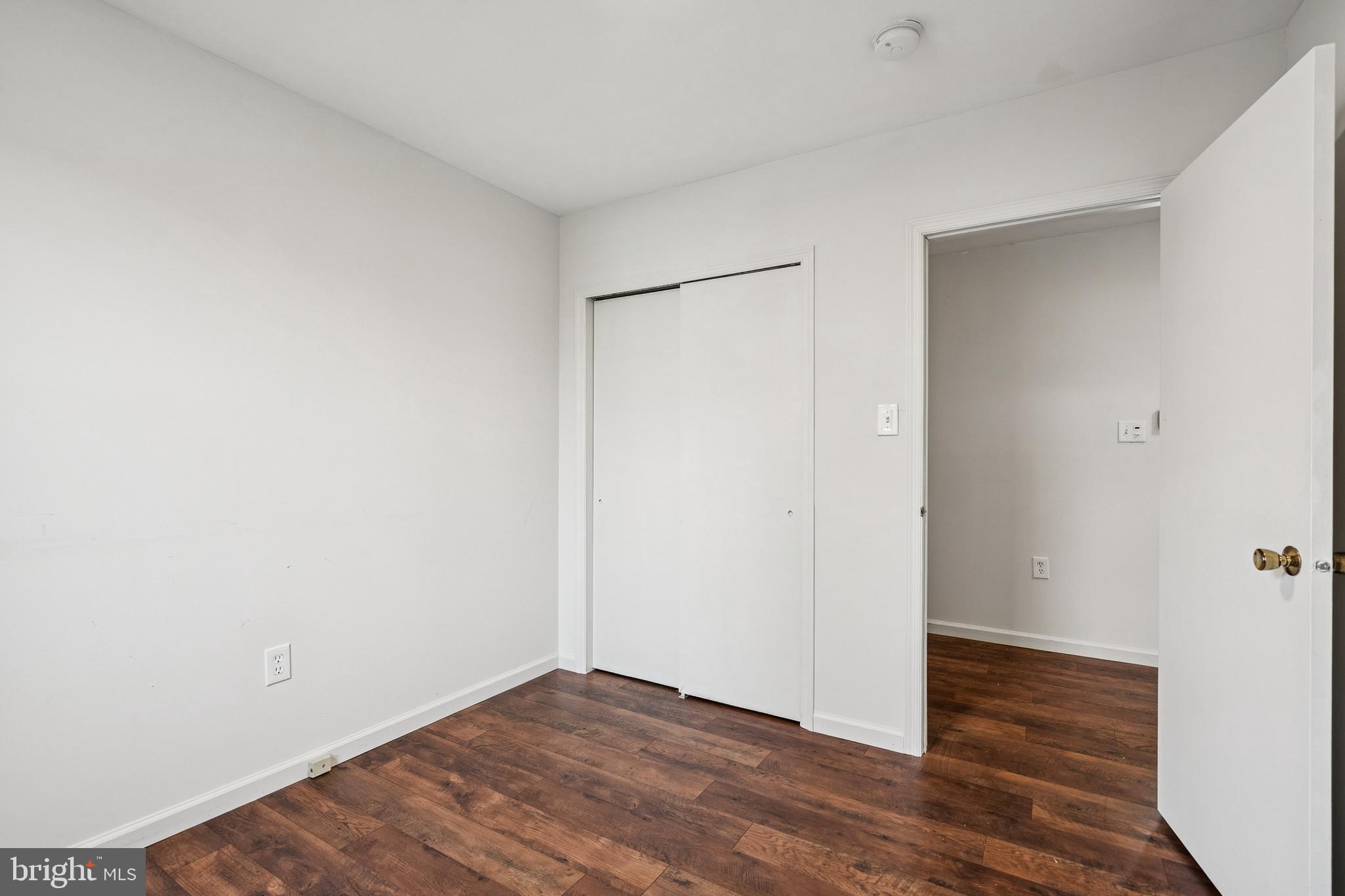 715 Cooper Landing Road Cherry Hill, NJ 08002 - Photo 21 of 23 a view of an empty room with wooden floor
