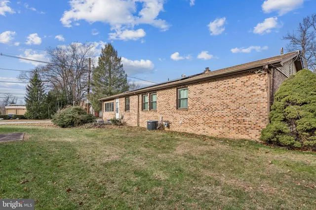 a view of a house with a big yard