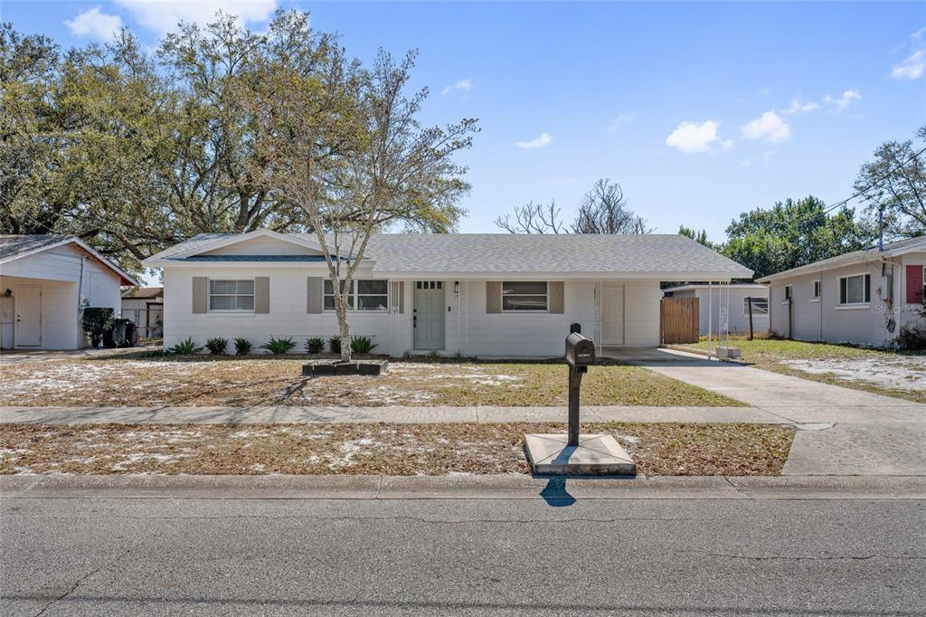 a house with yard in front of it