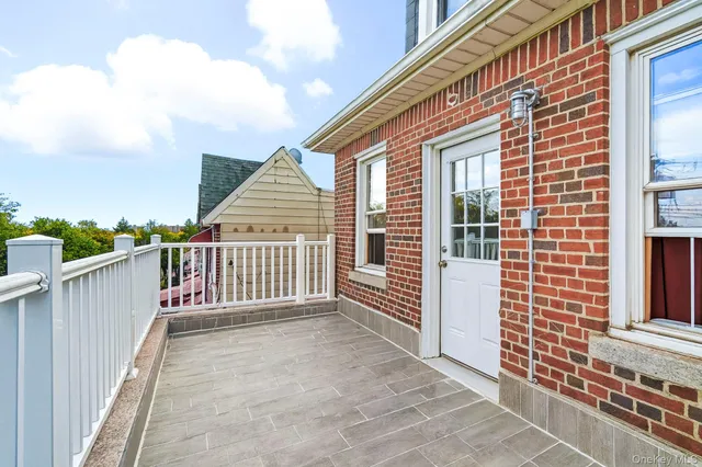 a view of a house with entrance gate