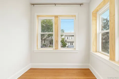 a view of a room that has a window in it