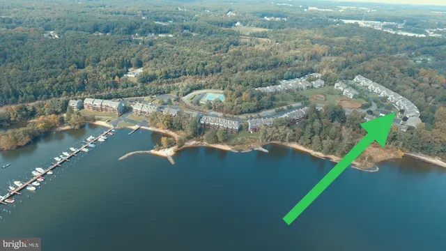 a view of a lake with a yard