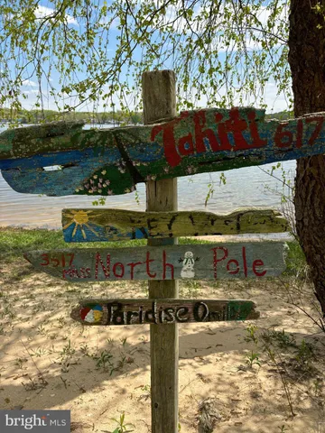 a view of outdoor space with playground and green space