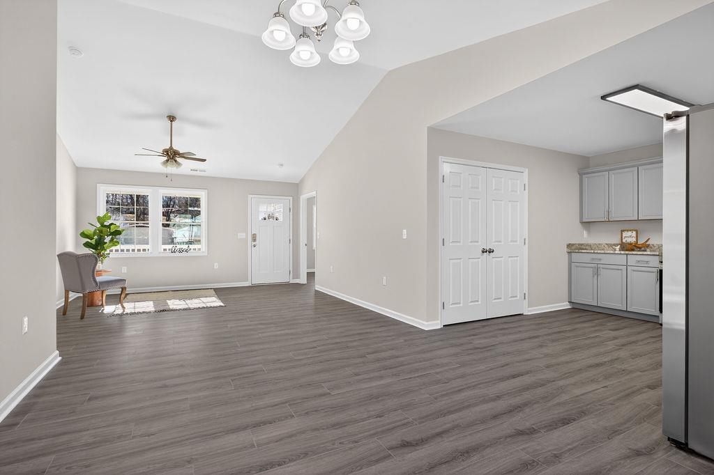 1637 A Street Waynesboro, VA 22980 - Photo 12 of 42 a view of an empty room with wooden floor and a window