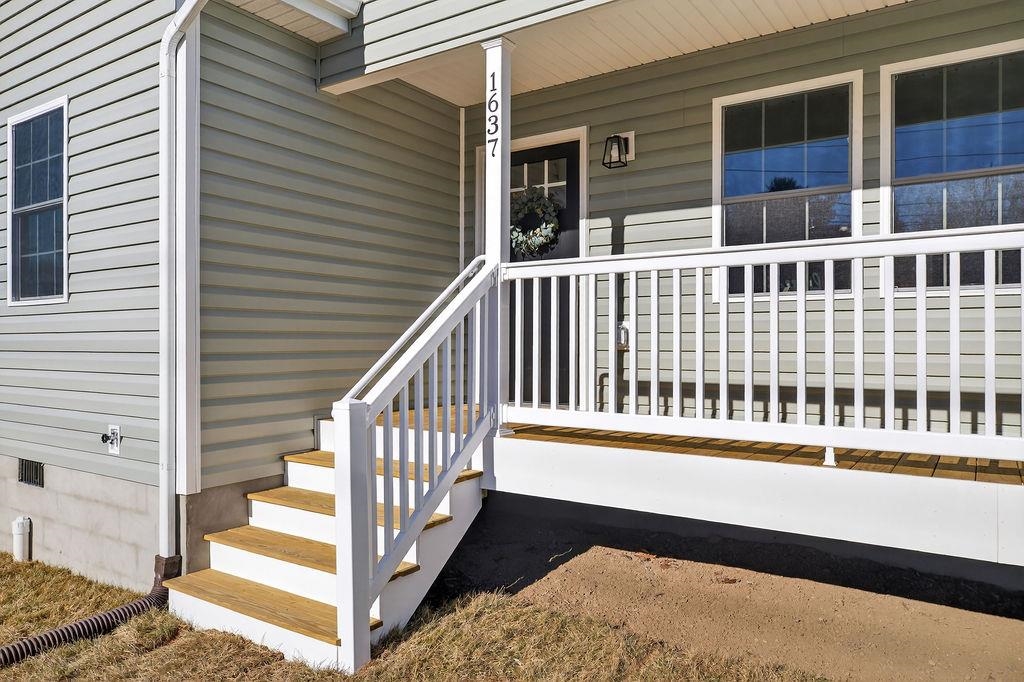 1637 A Street Waynesboro, VA 22980 - Photo 3 of 42 a front view of a house with a balcony