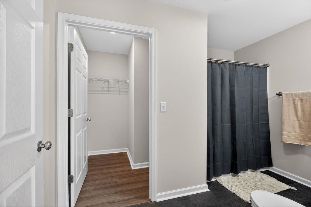 1637 A Street Waynesboro, VA 22980 - Photo 31 of 42 a view of a hallway with wooden floor