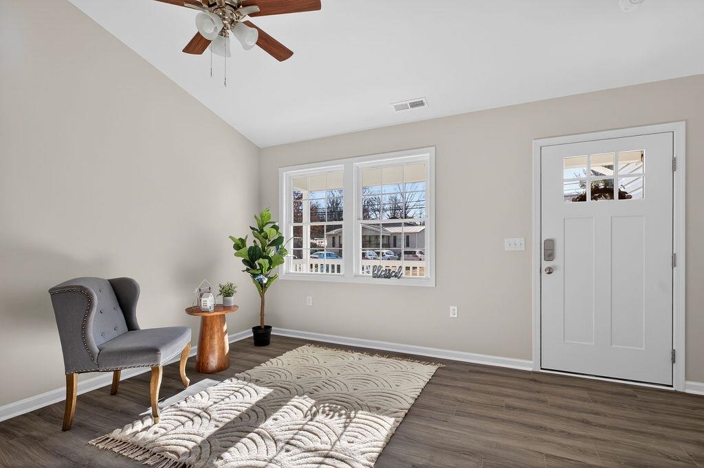1637 A Street Waynesboro, VA 22980 - Photo 7 of 42 a view of a livingroom with furniture and a potted plant