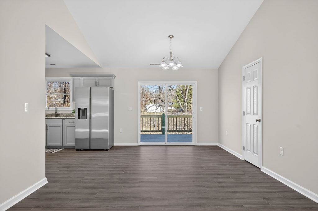 1637 A Street Waynesboro, VA 22980 - Photo 10 of 42 a view of a kitchen with a sink and dishwasher wooden floor