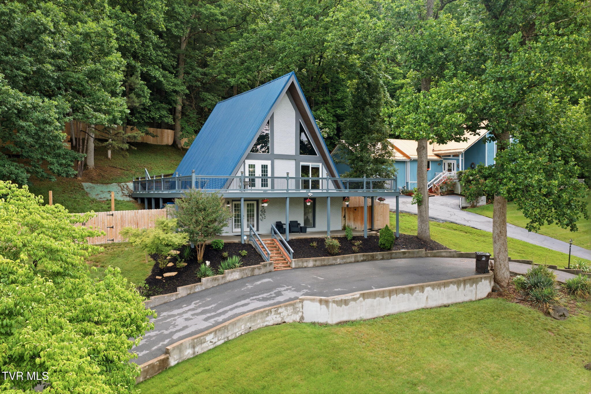 440 Lakeshore Road Bluff City, TN 37618 - Photo 2 of 56 12-web-or-mls-002_DJI_20260527104638_028