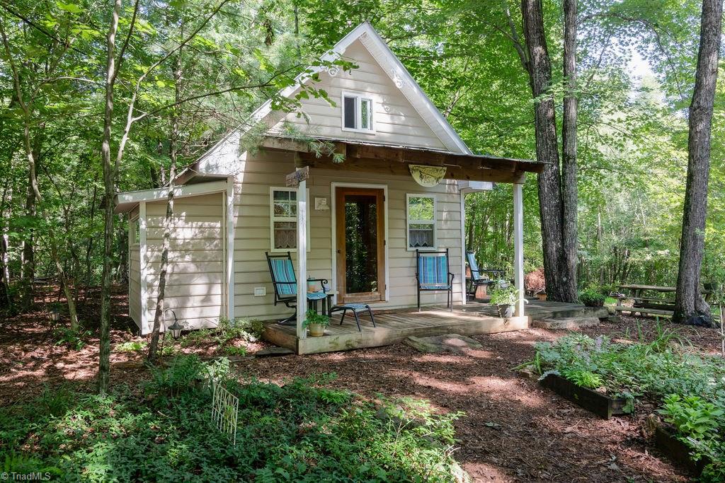 726 Whisper Ridge Lane Elkin, NC 28621 - Photo 22 of 27 Words really can't describe this charming cottage. Featuring a kitchen, full bath, two twin beds, and a kids loft it is perfect for kids as well as guests and even Grandma and Grandpa!