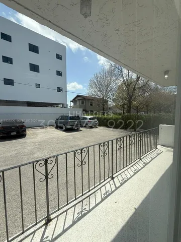 a view of houses with yard