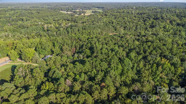 a view of a big yard with green space
