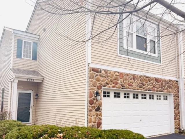 a view of a house with a street