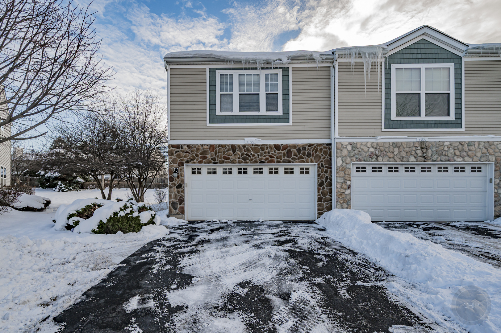 4055 Blackstone Drive, Unit 4055 Aurora, IL 60504 - Photo 2 of 43 a front view of a house with a yard