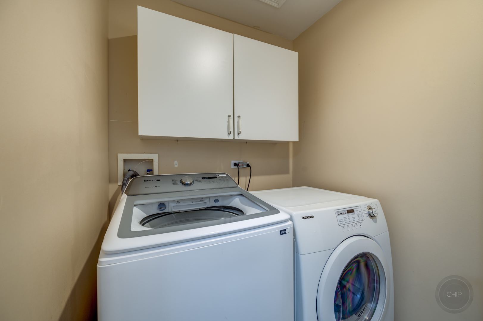 4055 Blackstone Drive, Unit 4055 Aurora, IL 60504 - Photo 26 of 43 a utility room with dryer and washer