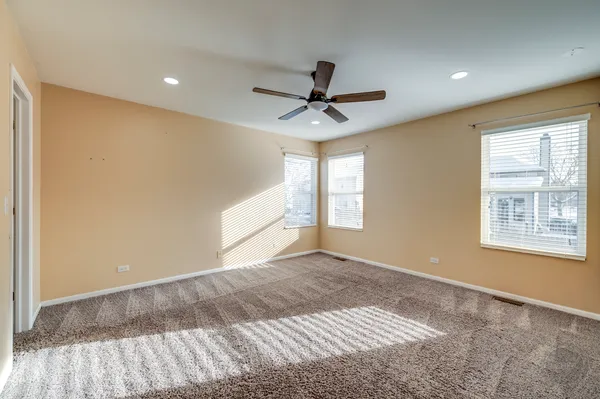 a view of an empty room and window