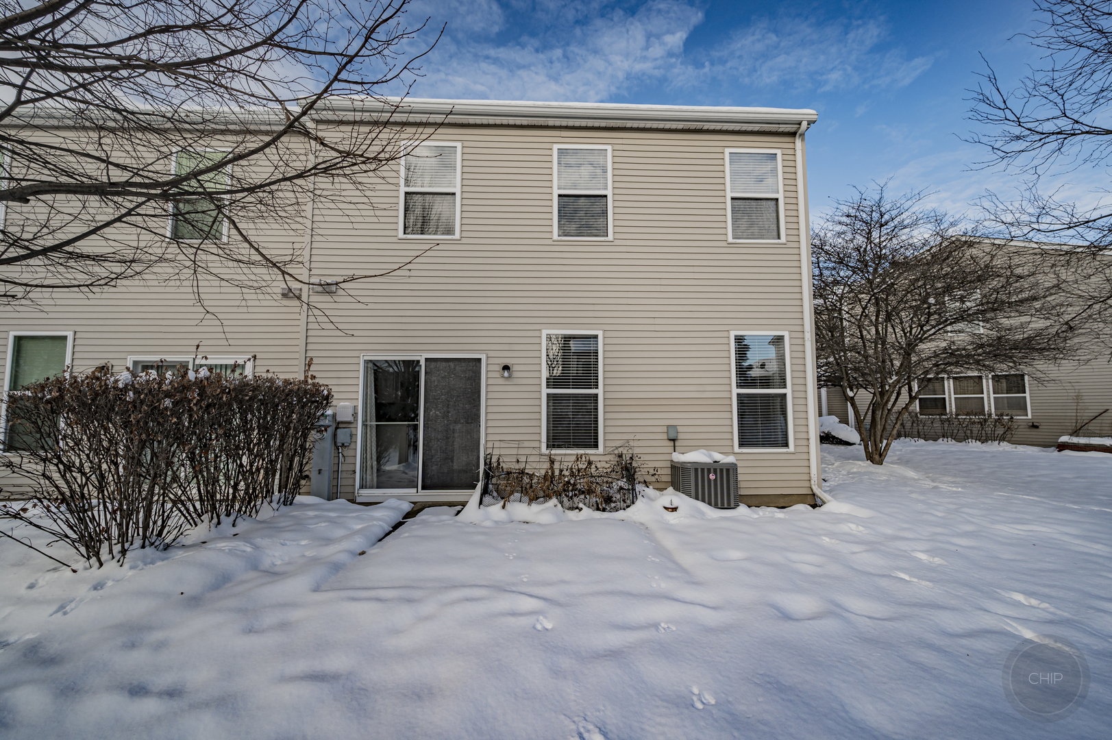 4055 Blackstone Drive, Unit 4055 Aurora, IL 60504 - Photo 40 of 43 a view of a house with a yard