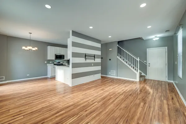 a view of kitchen with cabinets and stainless steel appliances