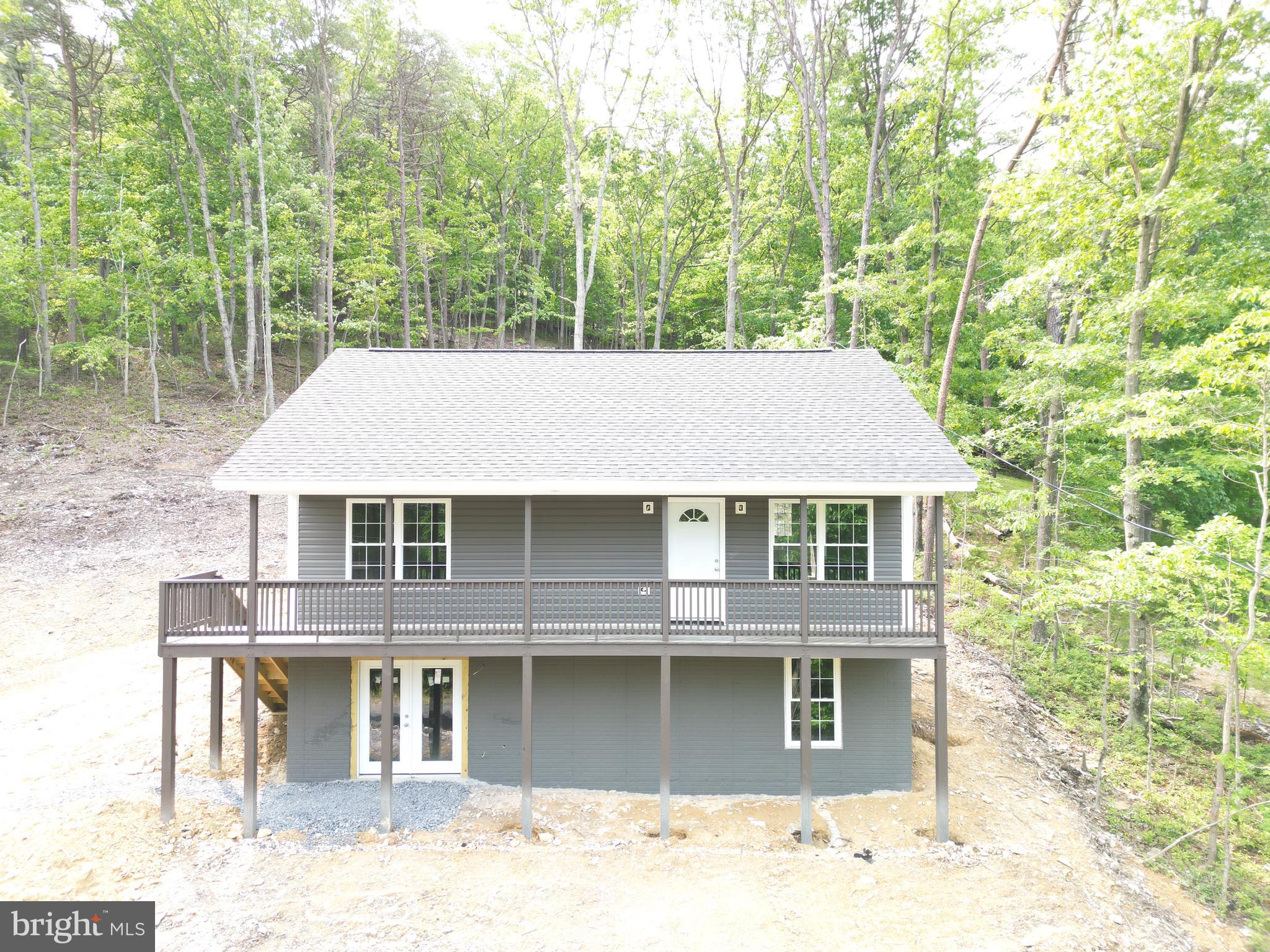 230 Spring Hollow Road Front Royal, VA 22630 - Photo 35 of 37 front view of a house with a dry yard