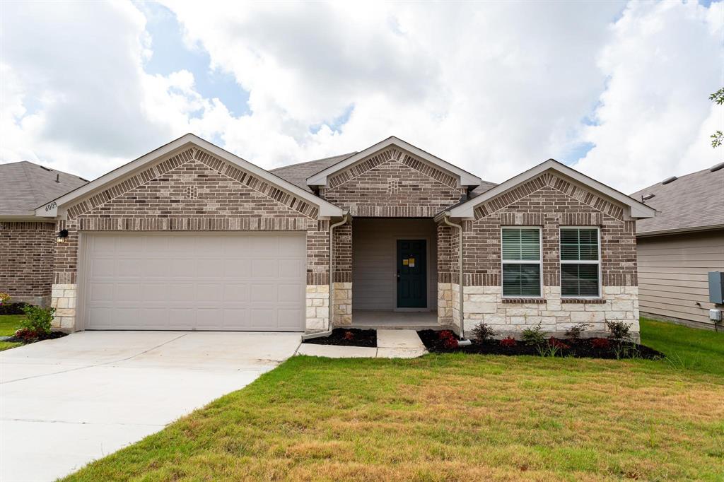 6009 Ronee Leah Drive Austin, TX 78724 - Photo 1 of 16 A well-maintained facade features a mix of brick and stone, enhancing this welcoming single-story residence.