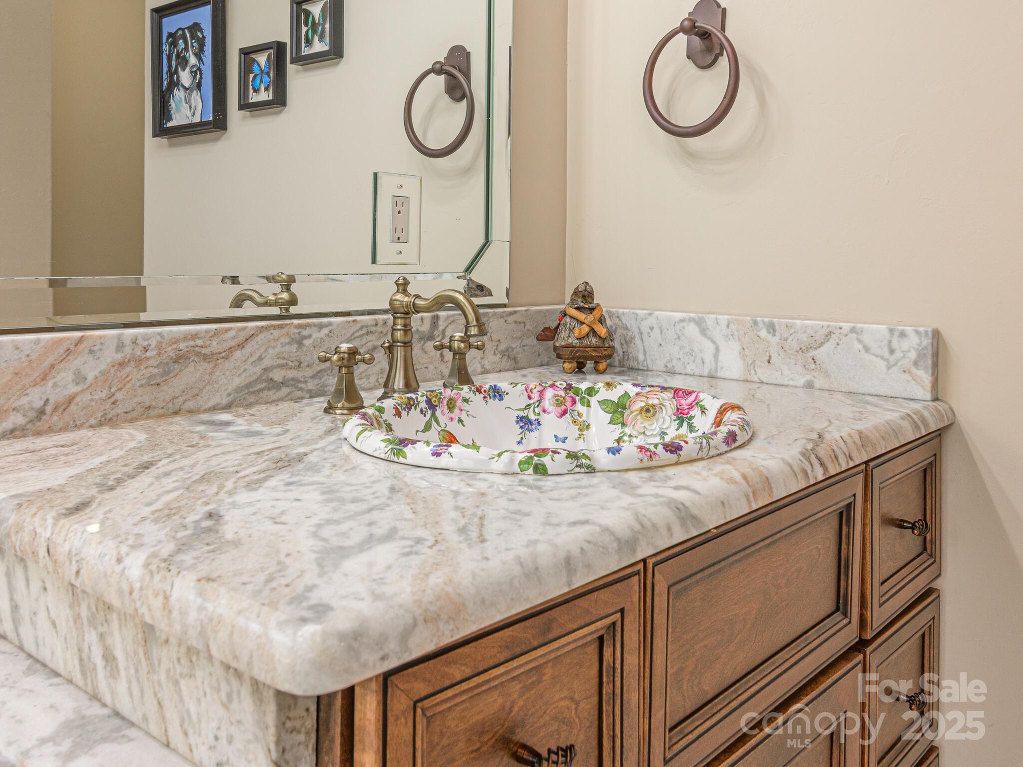 176 Valley Springs Road Asheville, NC 28803 - Photo 19 of 48 a bathroom with a granite countertop sink and a mirror
