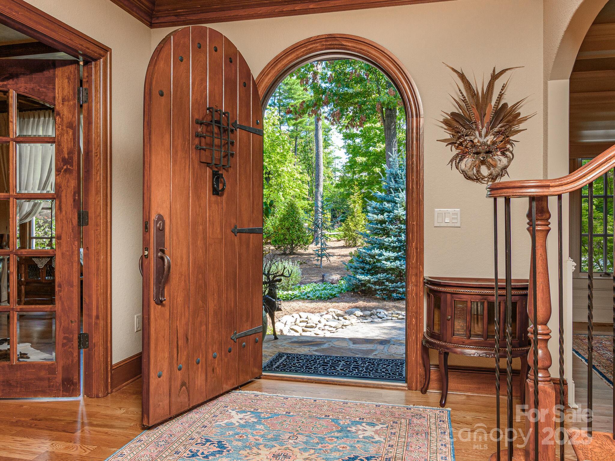176 Valley Springs Road Asheville, NC 28803 - Photo 2 of 48 a view of an entryway with a door