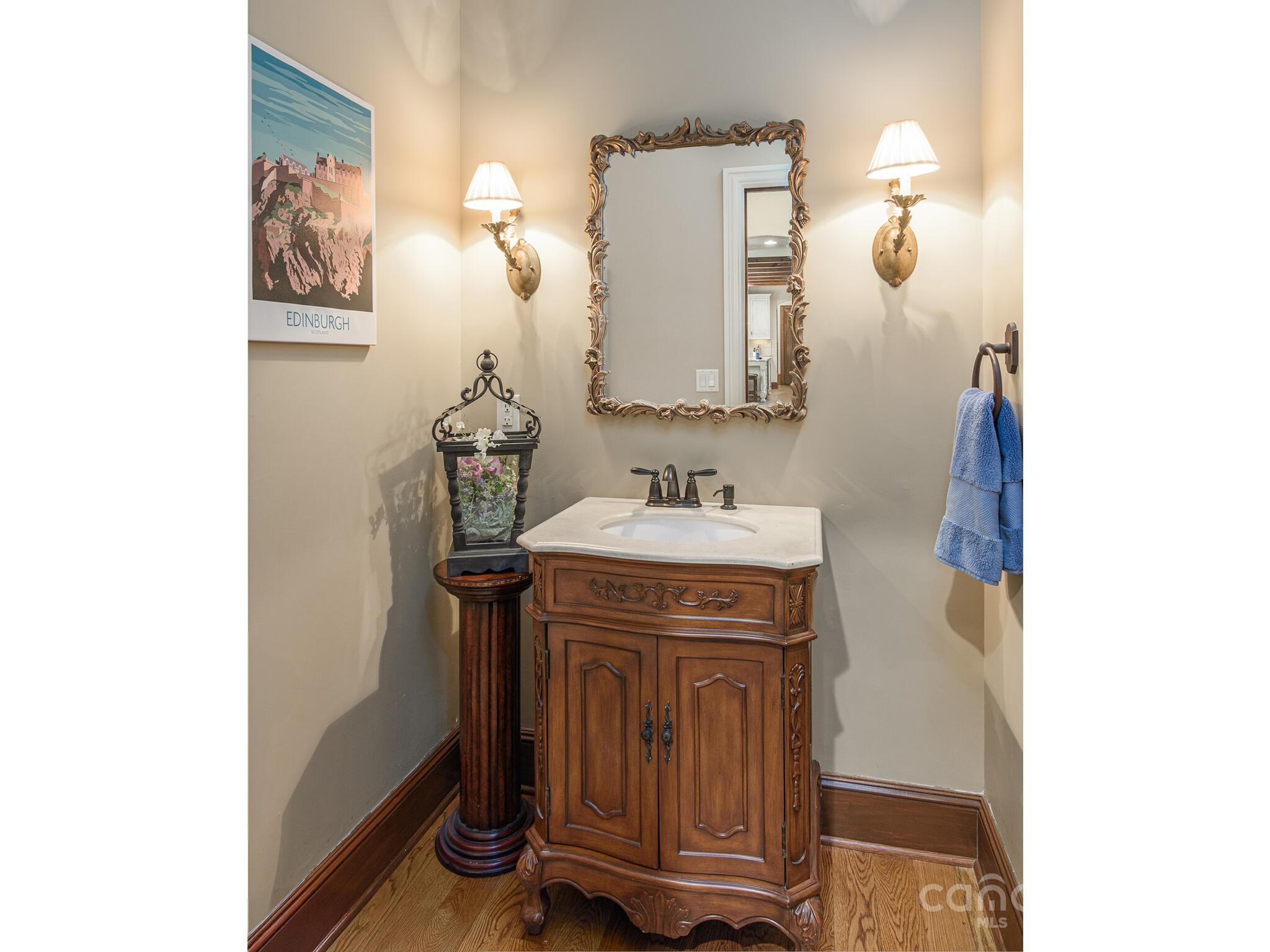 176 Valley Springs Road Asheville, NC 28803 - Photo 21 of 48 a bathroom with a sink and a mirror