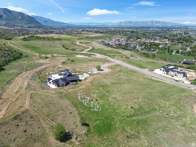1284 Middle Canyon Court, Unit 69 Mapleton, UT 84664 - Photo 20 of 20 Drone / aerial view of a mountain backdrop