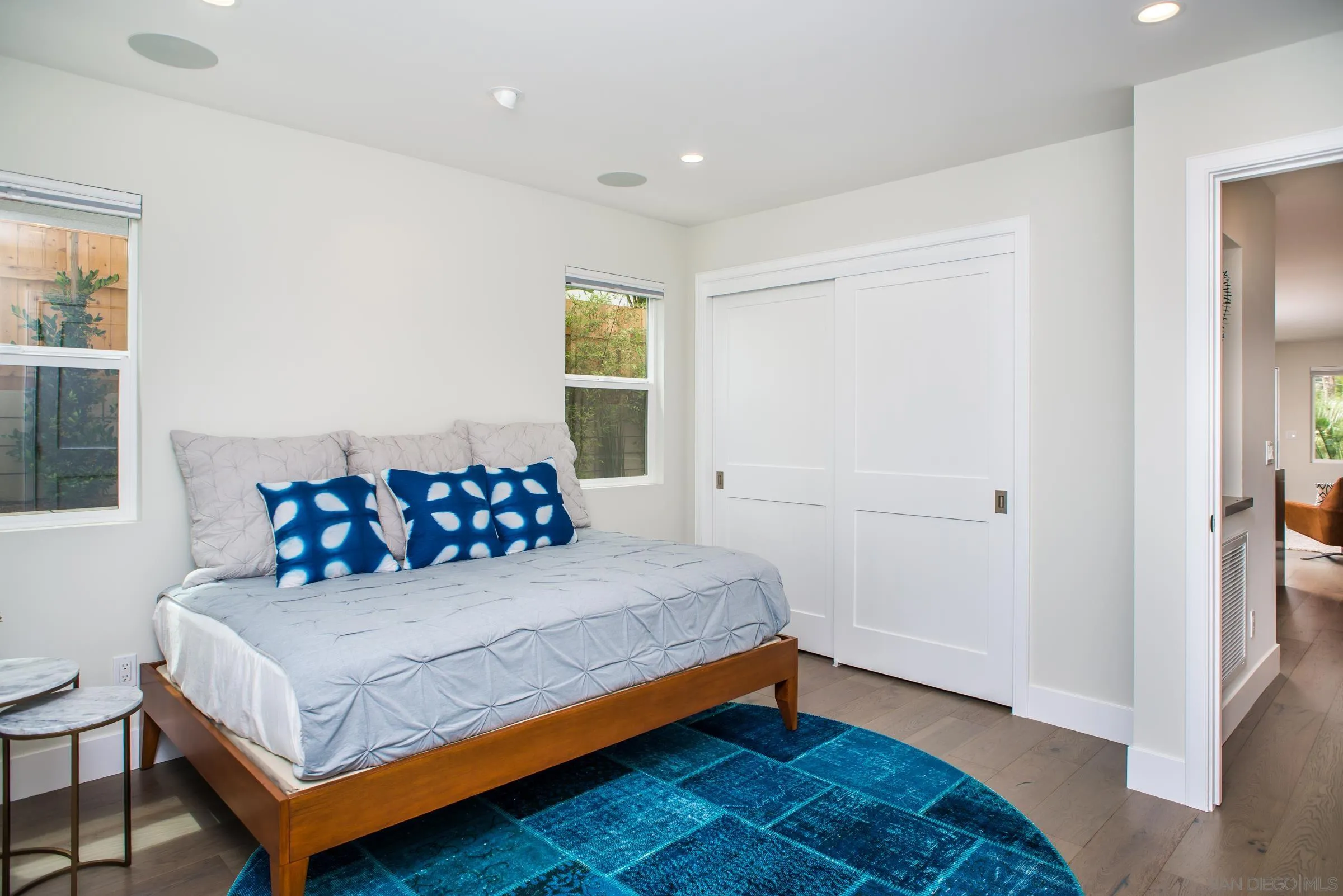 129 West Jason Street Encinitas, CA 92024 - Photo 20 of 44 a bedroom with a bed and a window