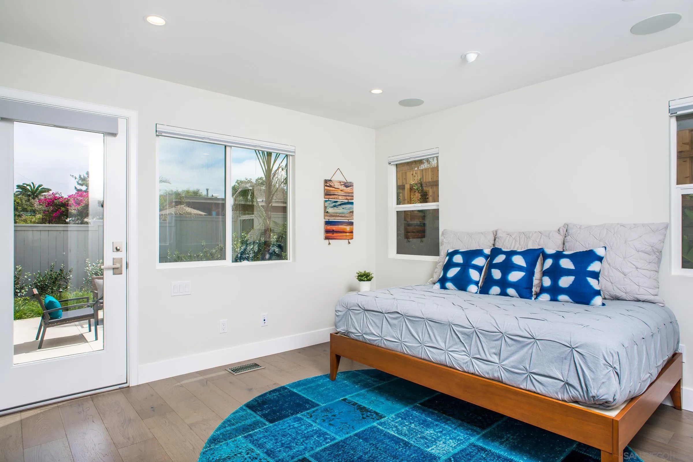 129 West Jason Street Encinitas, CA 92024 - Photo 21 of 44 a bedroom with a bed and a window