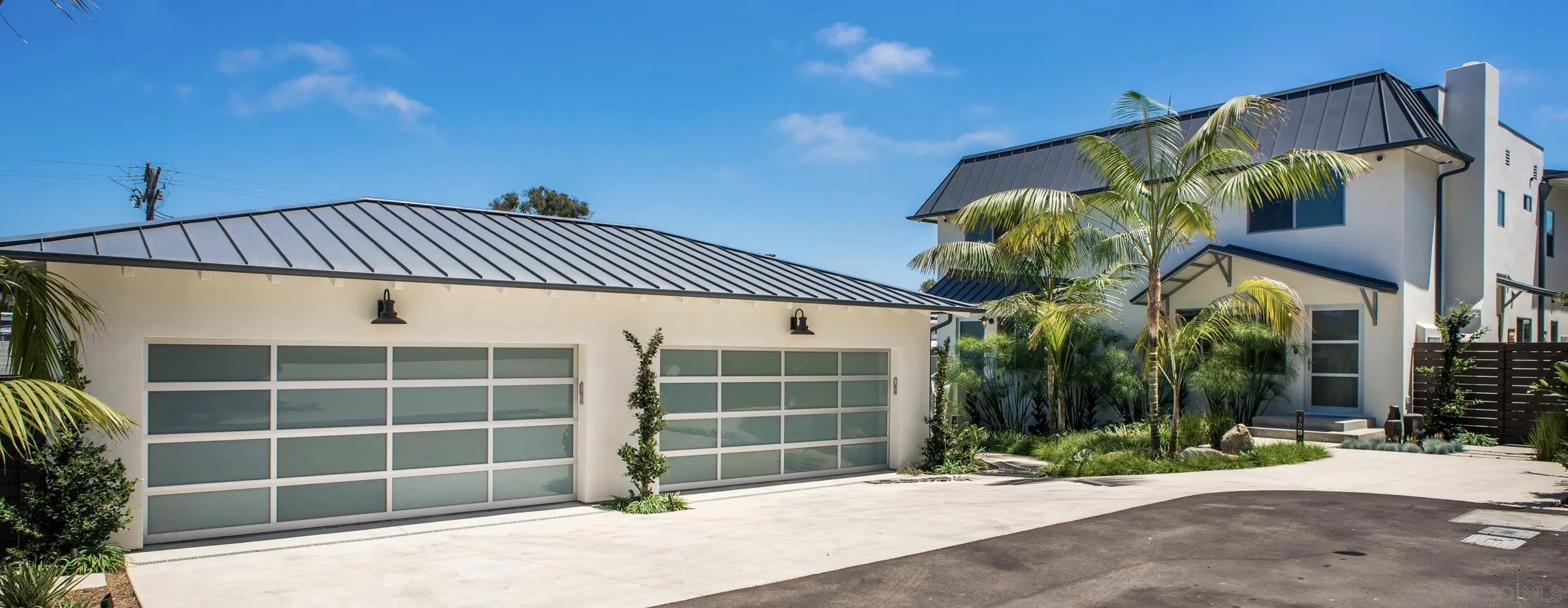 129 West Jason Street Encinitas, CA 92024 - Photo 42 of 44 a front view of a house with a garage