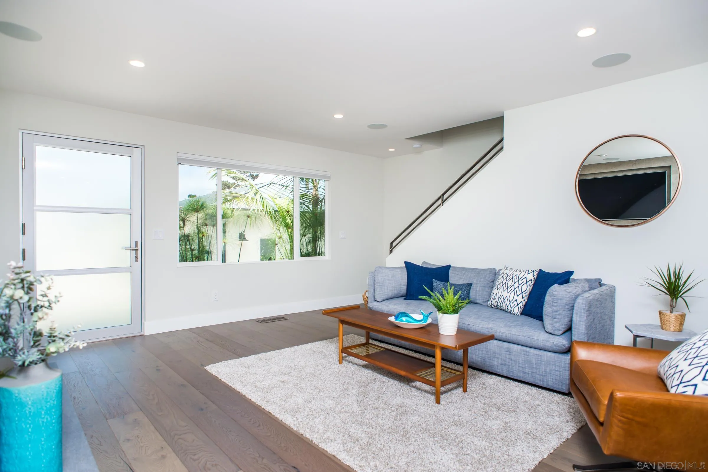 129 West Jason Street Encinitas, CA 92024 - Photo 7 of 44 a living room with furniture and a large window