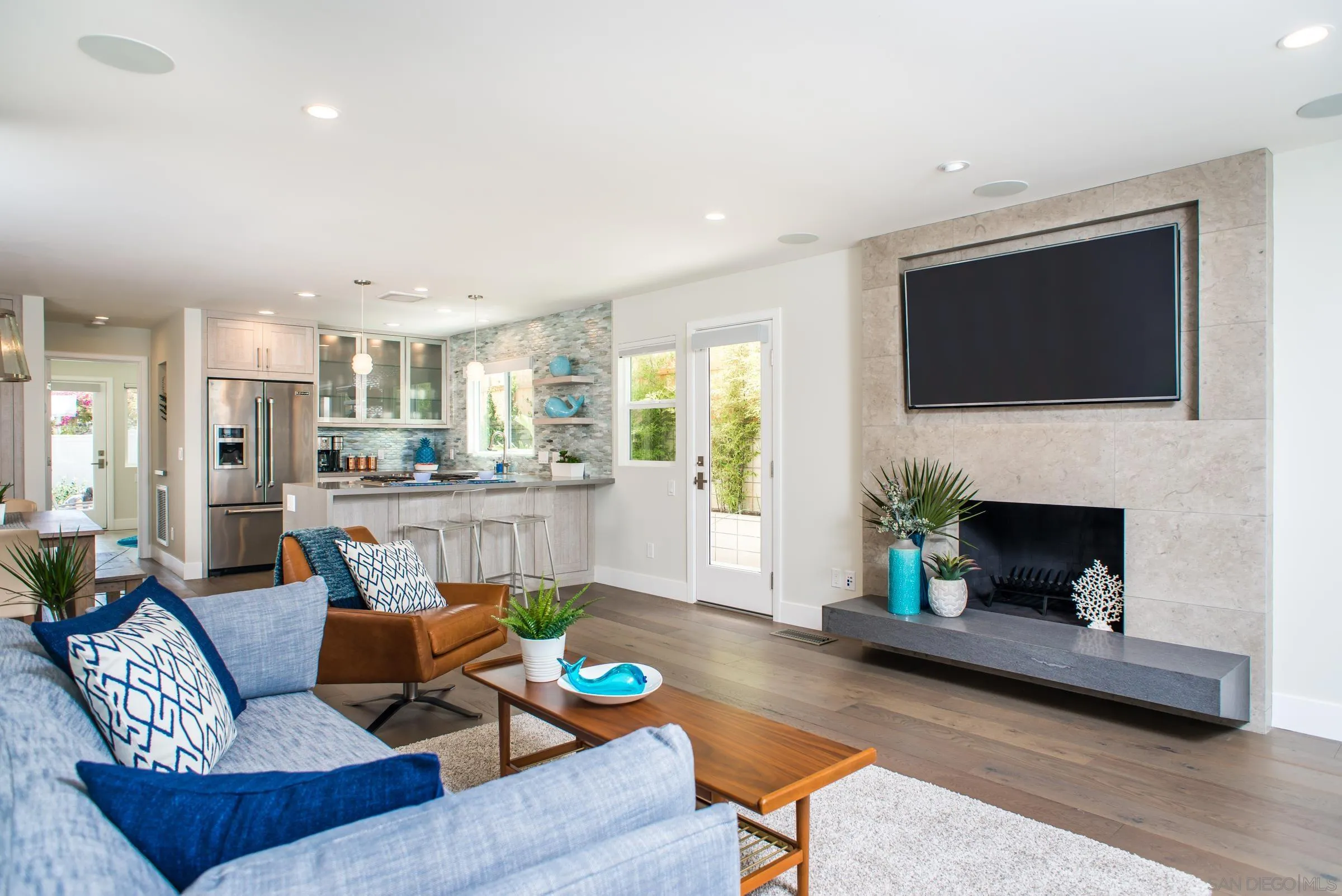 129 West Jason Street Encinitas, CA 92024 - Photo 9 of 44 a living room with furniture and a fireplace