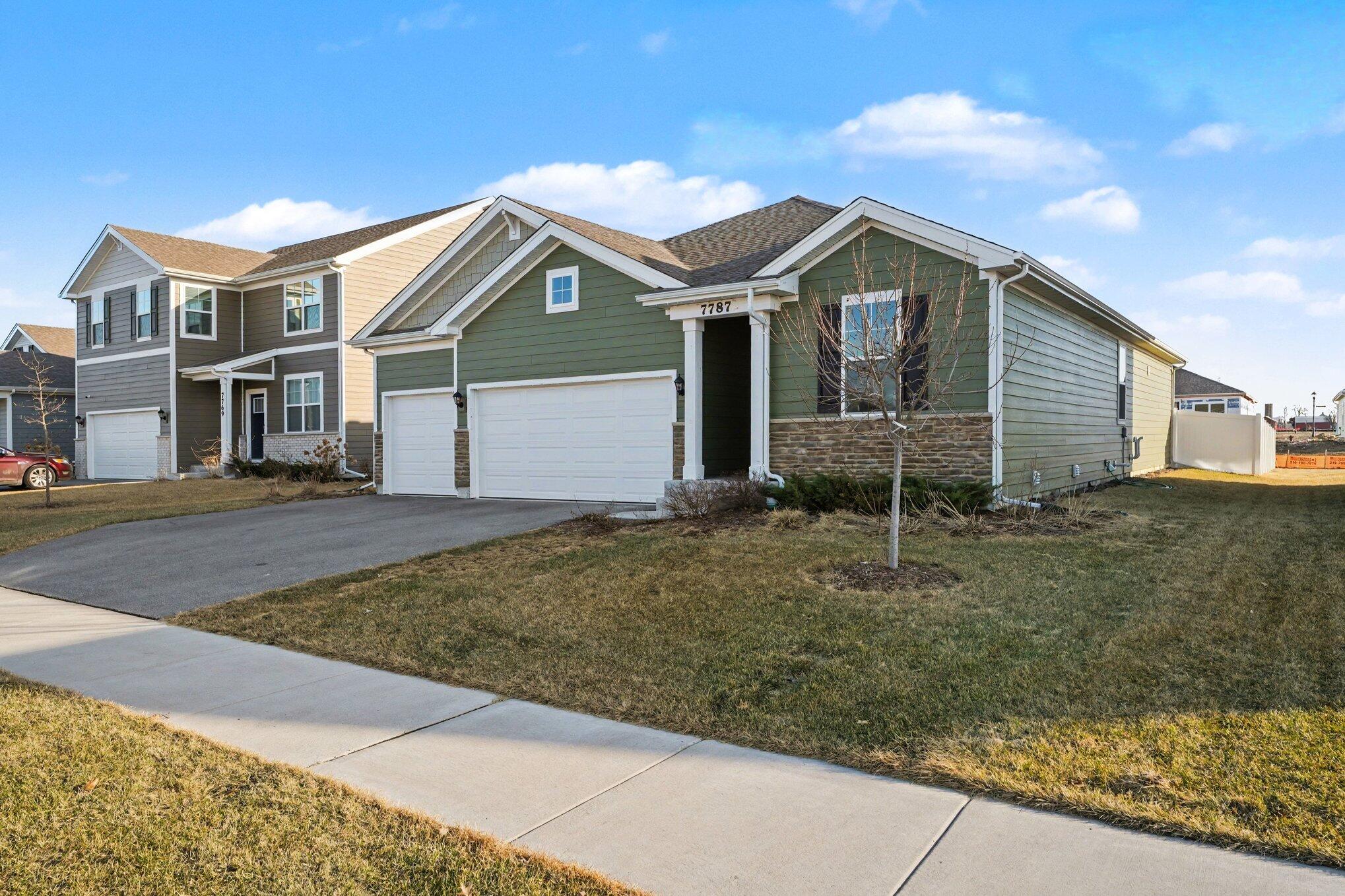 7787 West 105th Place Crown Point, IN 46307 - Photo 2 of 32 a view of outdoor space yard and front view of a house