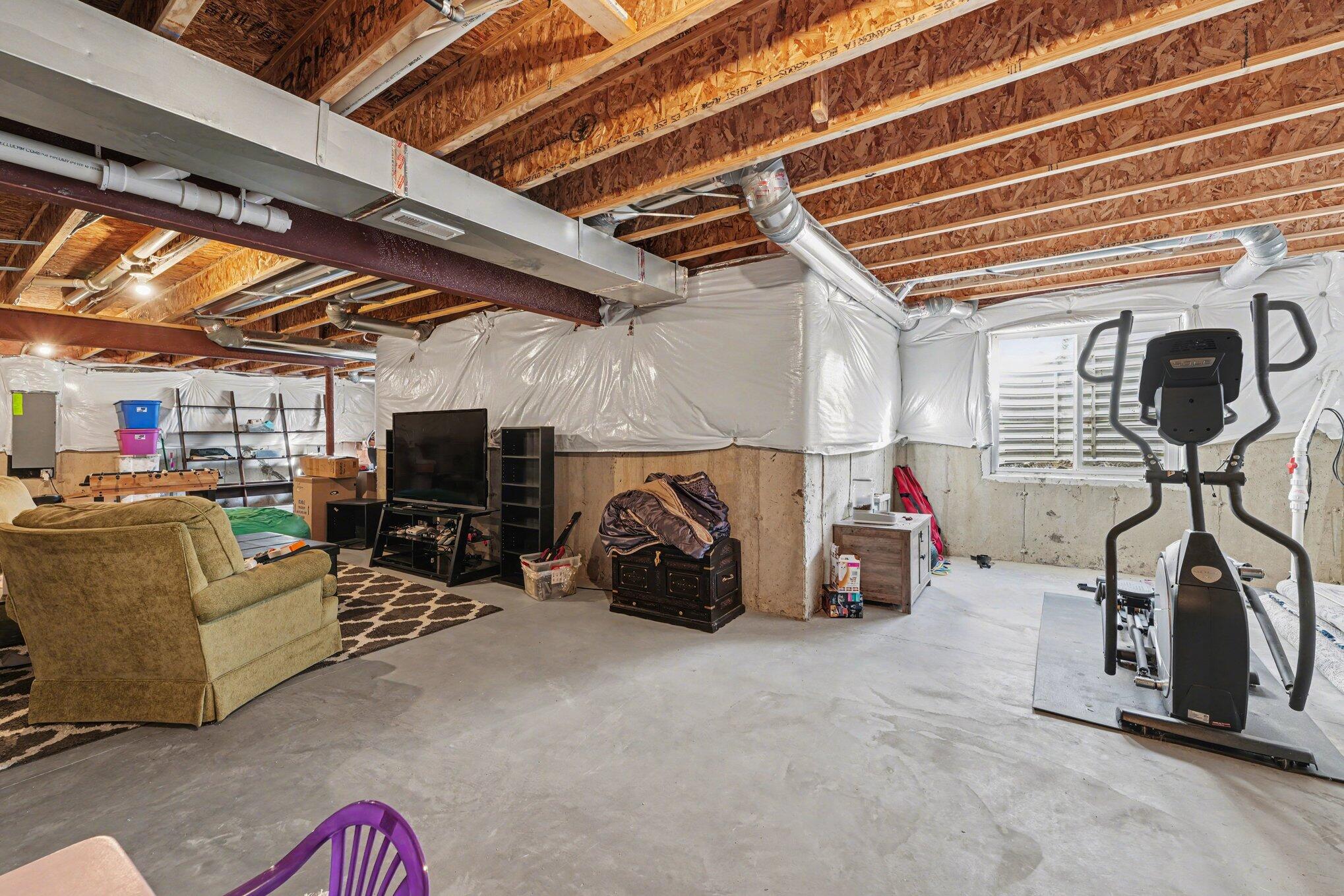 7787 West 105th Place Crown Point, IN 46307 - Photo 24 of 32 a view of a room with gym equipment