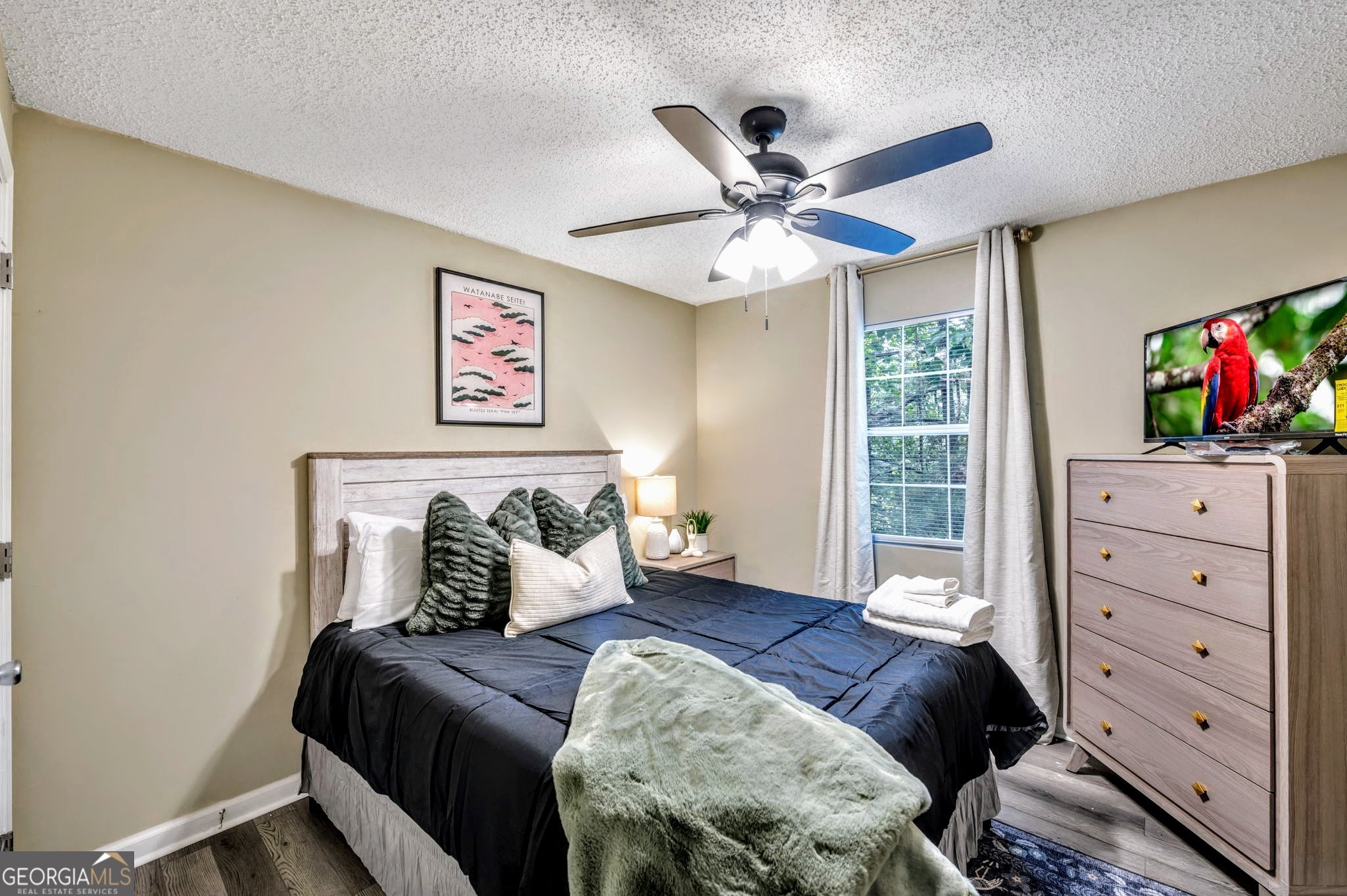 221 Remington Lane Acworth, GA 30101 - Photo 15 of 21 a bedroom with a bed and a window