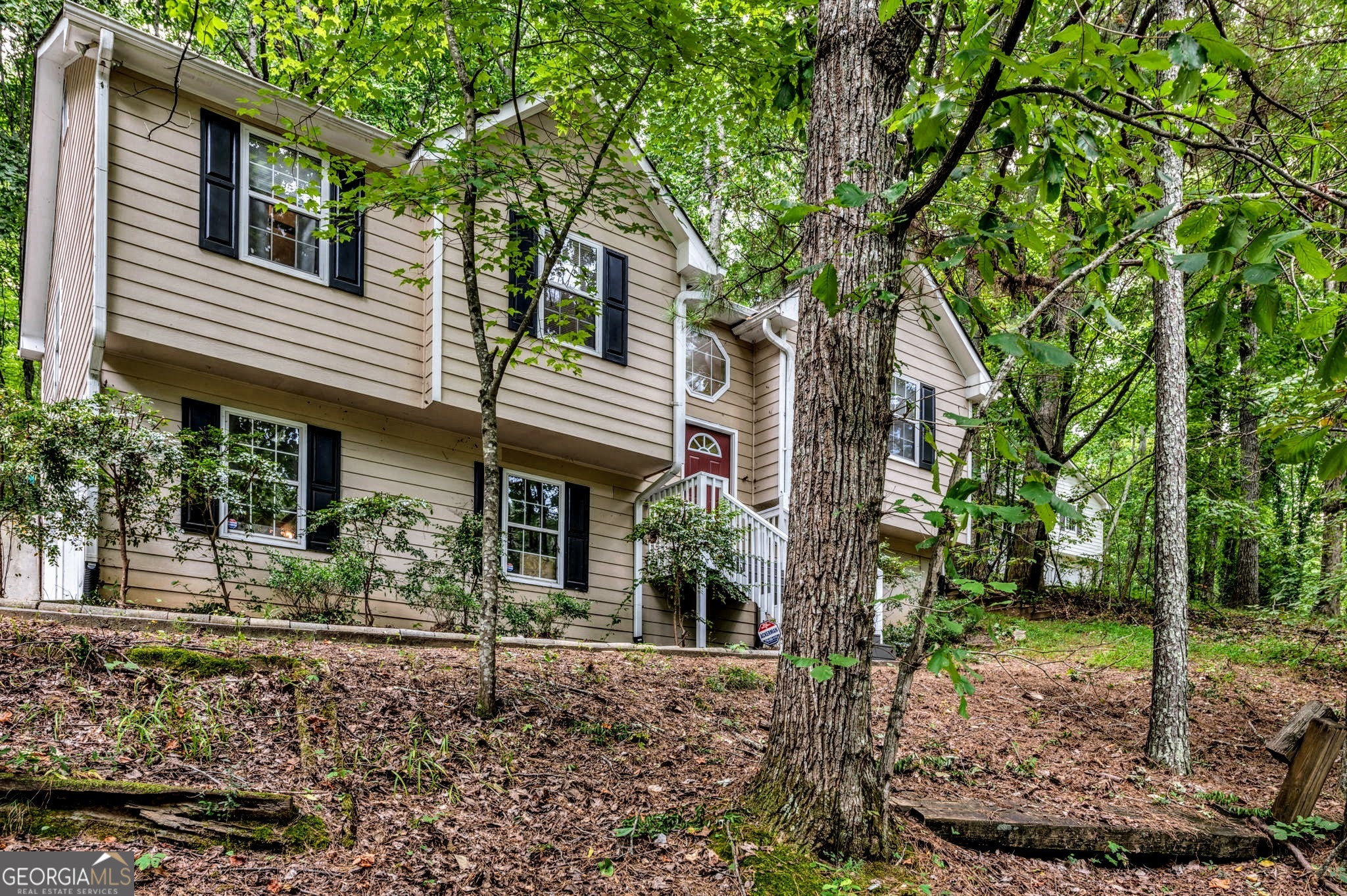 221 Remington Lane Acworth, GA 30101 - Photo 19 of 21 a front view of a house with garden
