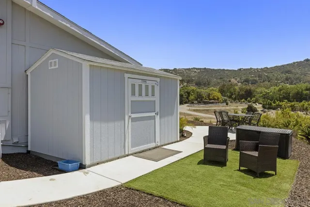an aerial view of a house with garden space