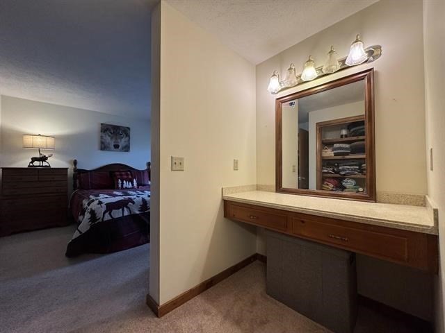43 West Meadow Road, Unit 43 Haverhill, MA 01832 - Photo 32 of 42 a view of a livingroom with furniture and a chandelier