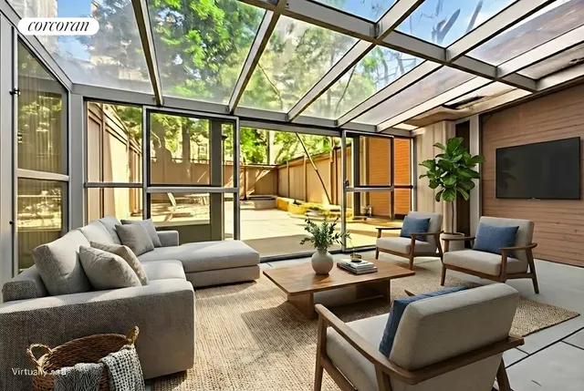 a spacious bedroom with a bed and a large window